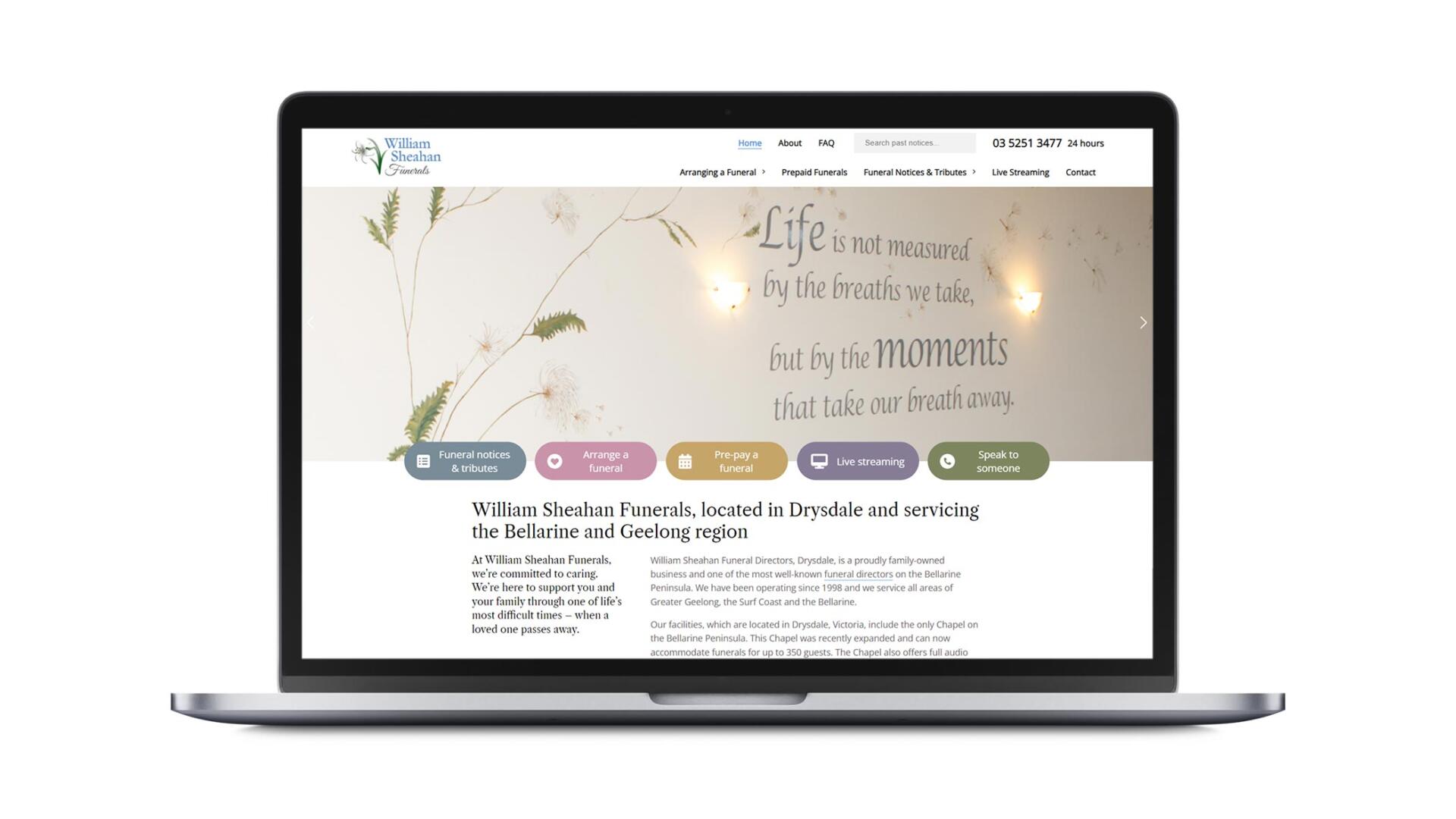 Open laptop showing custom designed WordPress website for Drysdale business